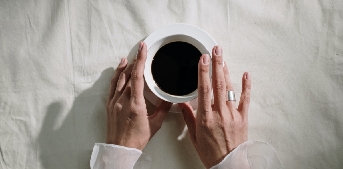 Drinking a cup of coffee. Image: Pexels - cottonbro
