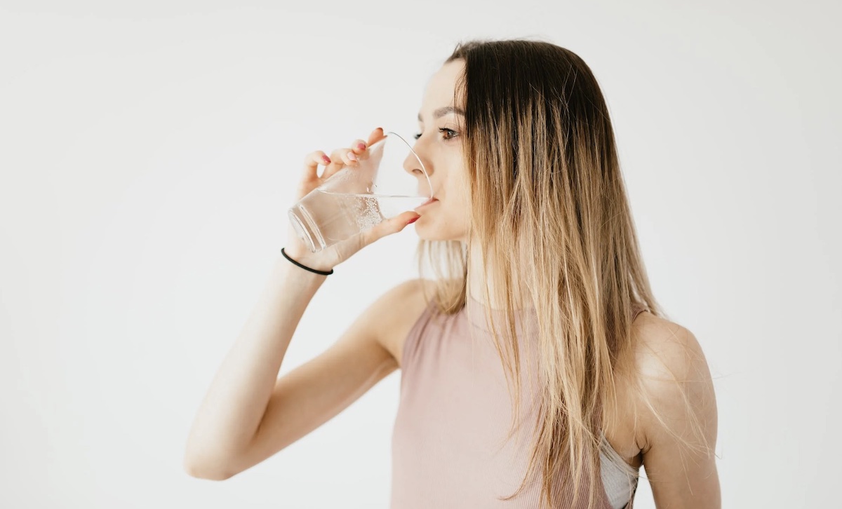 Woman drinking a glass of water