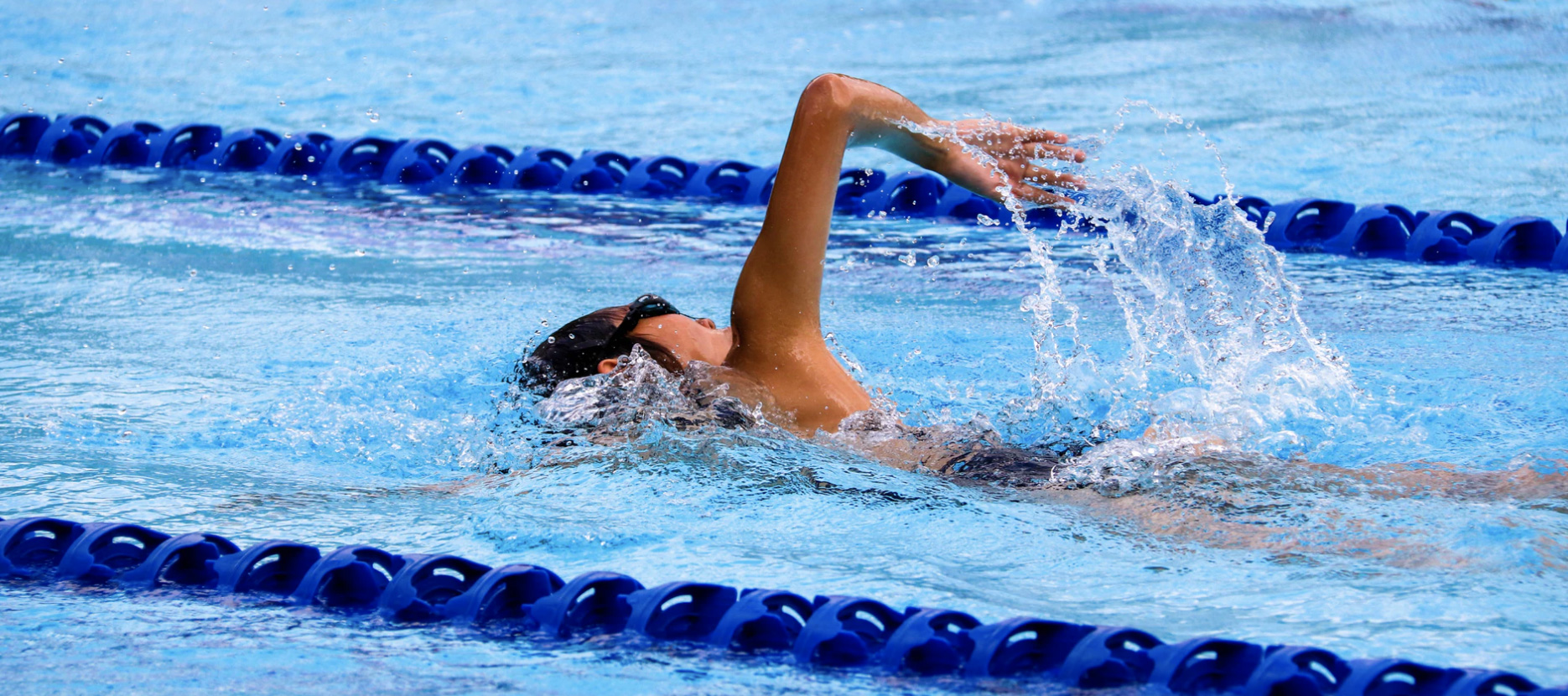 Man swimming in a pool