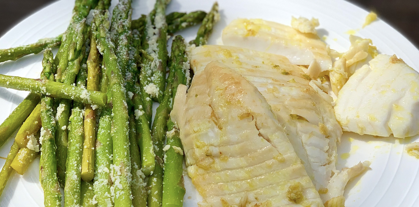 Asparagus and fish on a plate