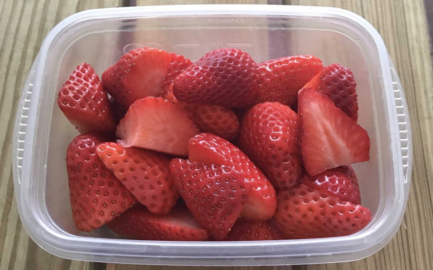 Strawberry in tupperware