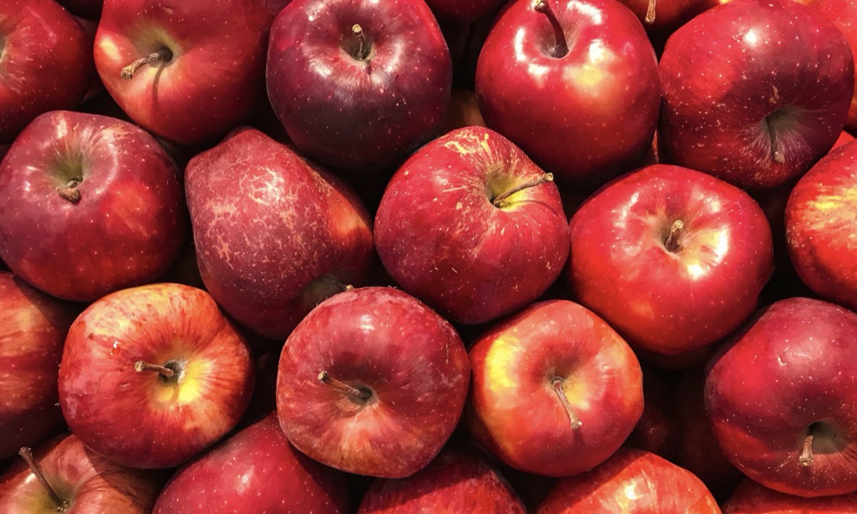 Many apples in a bucket