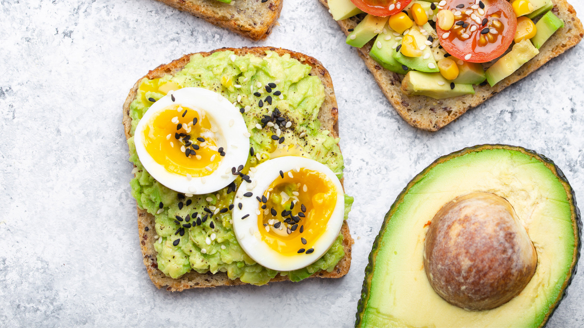 avocado toast with eggs and tomatoes