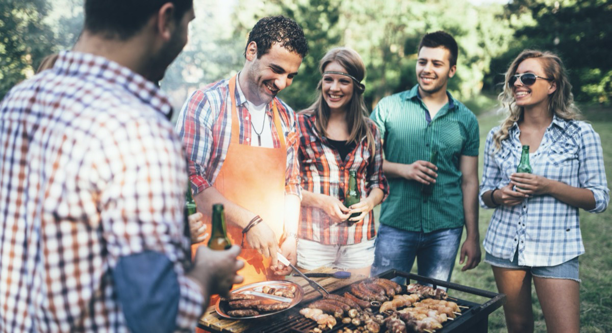 Friends enjoying a summer BBQ. Image: Canva