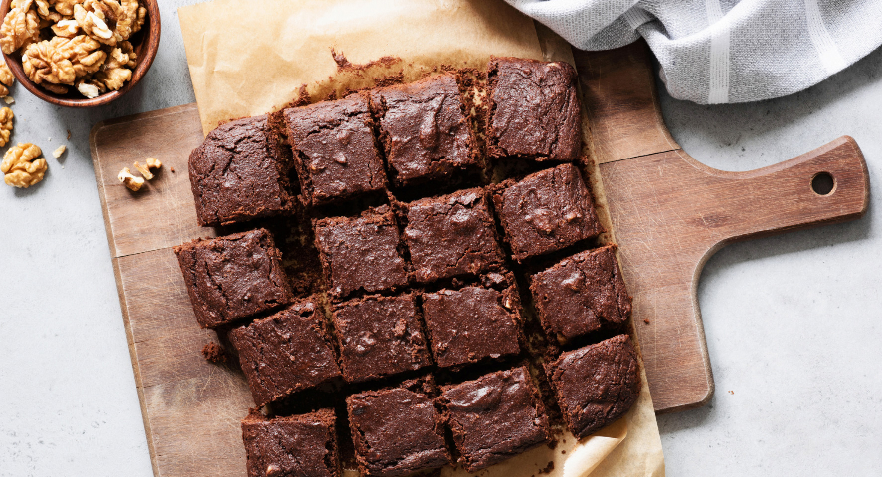 Brownies sliced on a cutting board 