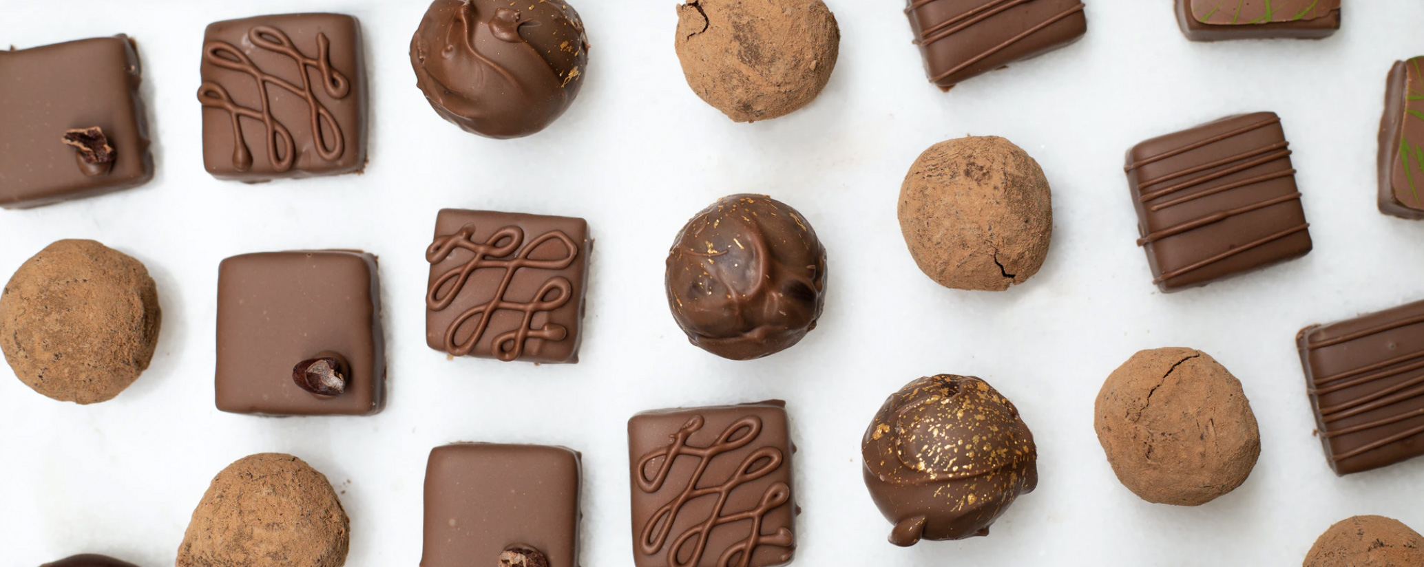 Chocolates spread out. Unsplash - Jessica Loaiza