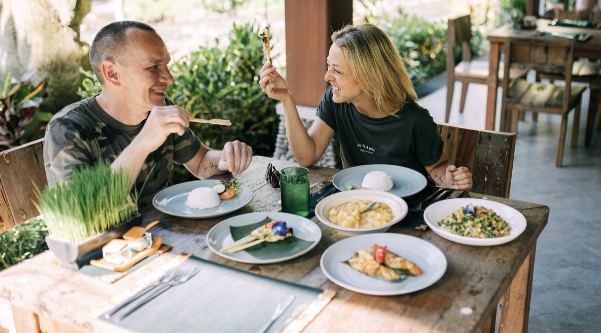 Friends eating at a restaurant together