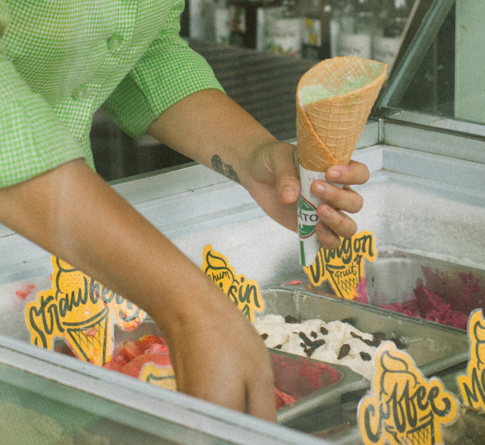 Woman scooping ice cream