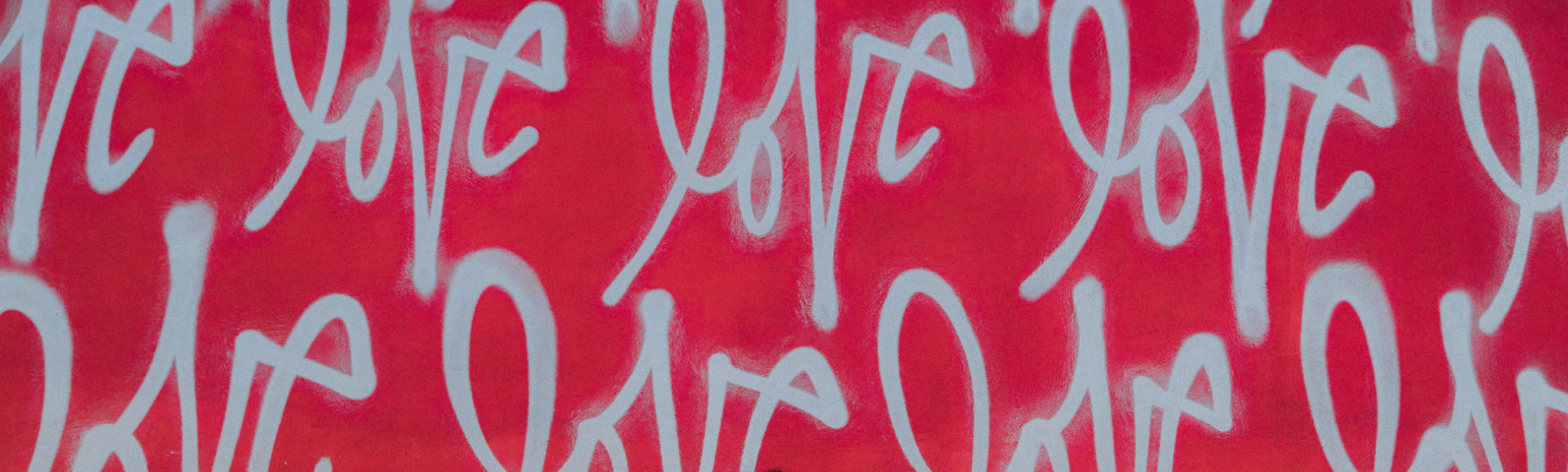 the word love written in graffitti 