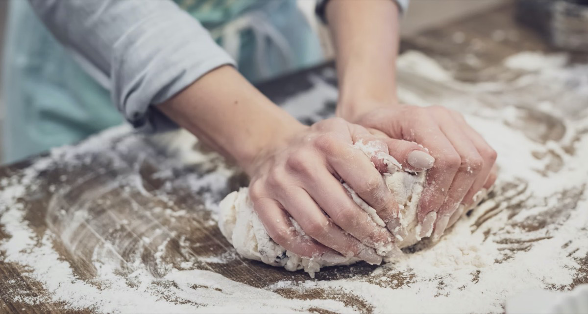 Preparing to bake dessert with dough.