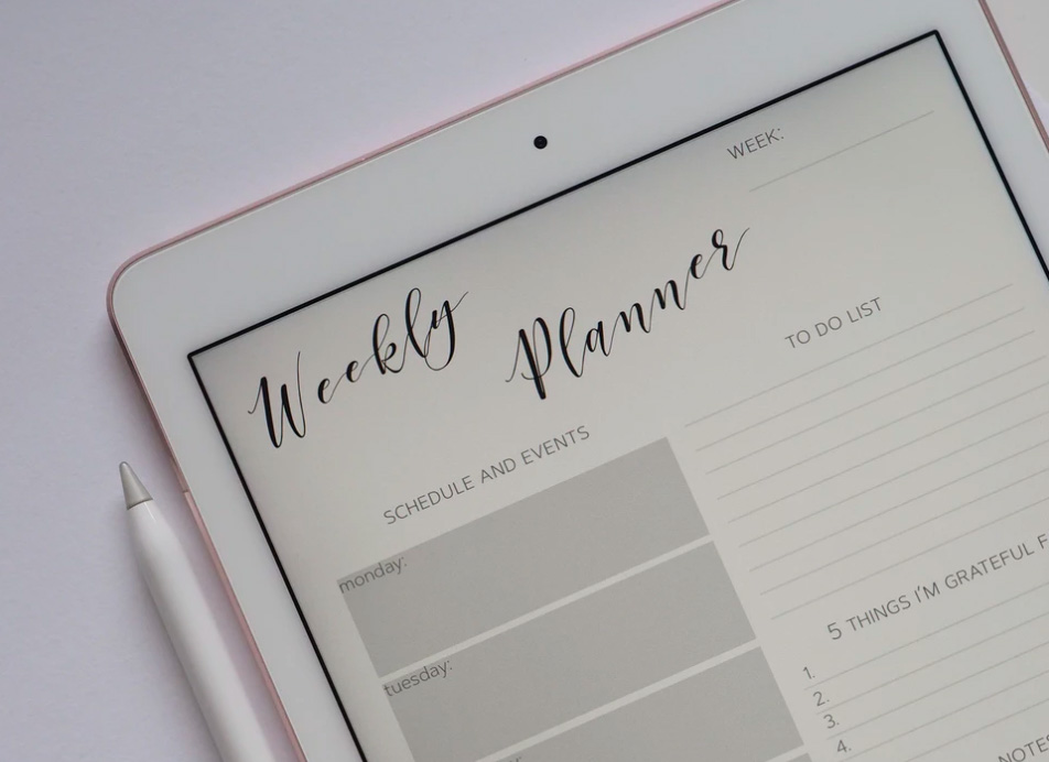 A weekly planner on a tablet. 