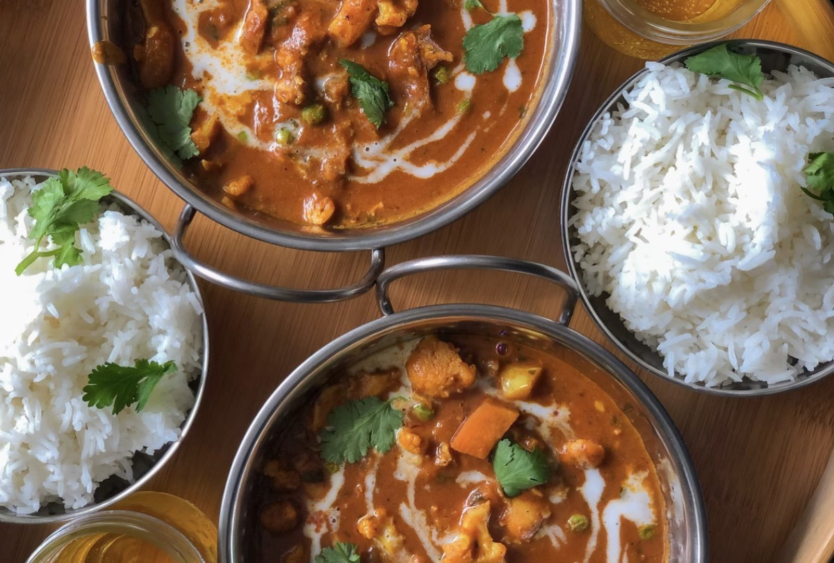 Vegan curry dish with rice.  Unsplash - Andy Hay