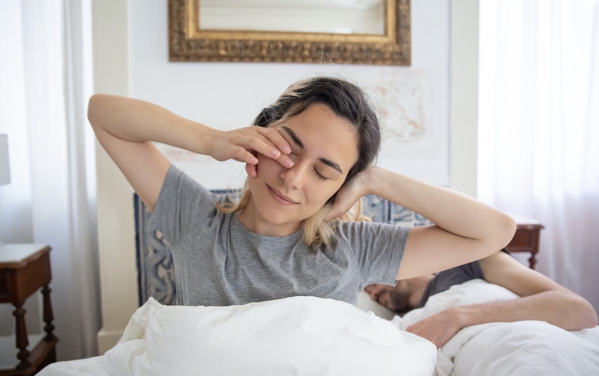 woman waking up in the morning