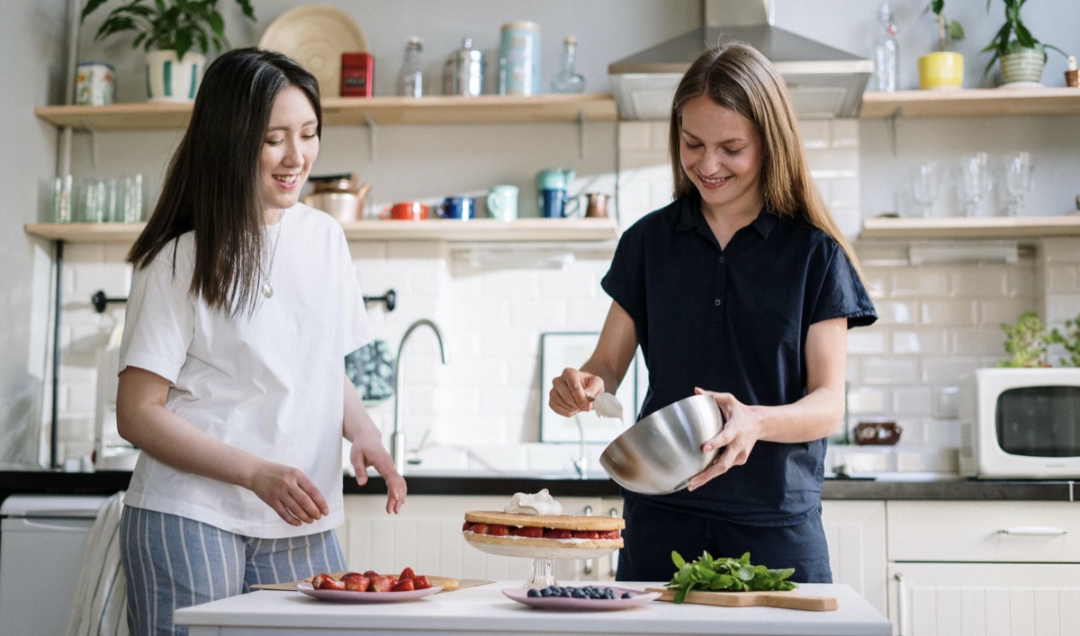Women making food in kitchen 